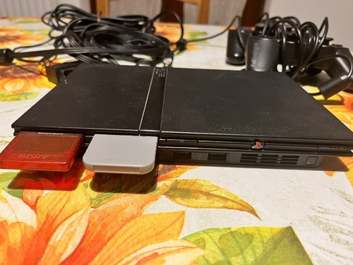 Playstation slim con due - con,